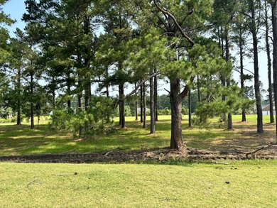 Level building lot with Boat Slip #2 (Tax Map #162-10-00-178-00) on Players Course At Wyboo Plantation in South Carolina - for sale on GolfHomes.com, golf home, golf lot