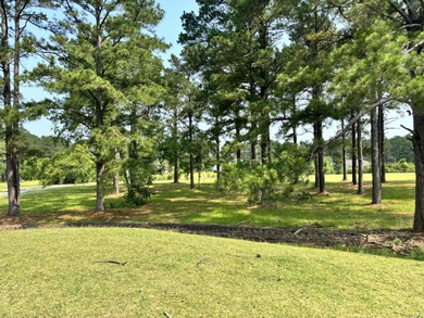 Level building lot with Boat Slip #2 (Tax Map #162-10-00-178-00) on Players Course At Wyboo Plantation in South Carolina - for sale on GolfHomes.com, golf home, golf lot