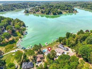 Lakefront Luxury Awaits! Wake up to stunning lake views in this on Lake Mohawk Golf Club in Ohio - for sale on GolfHomes.com, golf home, golf lot