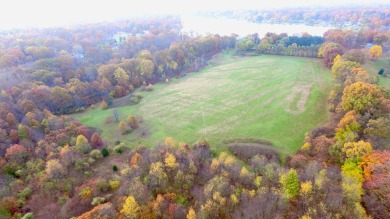 Welcome to your slice of paradise in the heart of Edwardsburg on Garver Lake Golf Course in Michigan - for sale on GolfHomes.com, golf home, golf lot