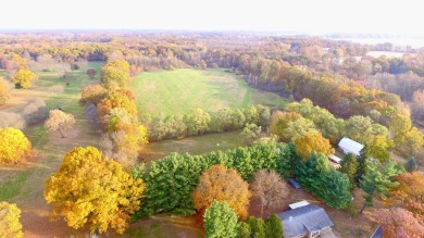 Welcome to your slice of paradise in the heart of Edwardsburg on Garver Lake Golf Course in Michigan - for sale on GolfHomes.com, golf home, golf lot