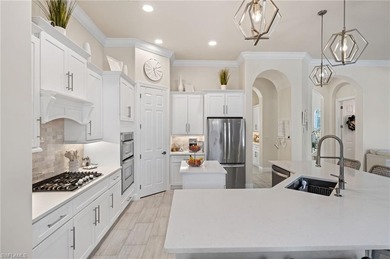 Welcome to 8559 El Mirasol Ct - a pristine, modernized on Estero Country Club in Florida - for sale on GolfHomes.com, golf home, golf lot