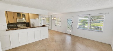 Step into this beautifully updated 2-bedroom, 1.5-bath condo in on Flamingo Lakes Country Club in Florida - for sale on GolfHomes.com, golf home, golf lot