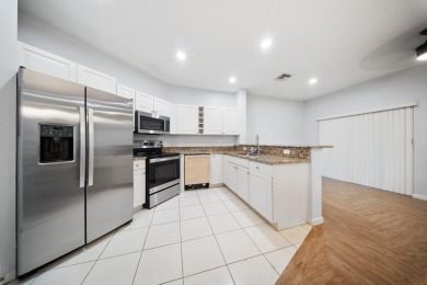 Bottom floor unit 2 bedroom and 2.5 bath located in Castle Pines on The Legacy Golf and Tennis Club in Florida - for sale on GolfHomes.com, golf home, golf lot