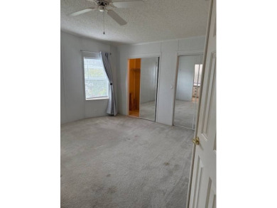 Manufactured Home on Leased Land with Lot Rent. Seek tranquility on Whisperwood Golf Course in Florida - for sale on GolfHomes.com, golf home, golf lot