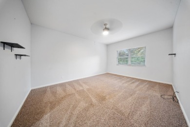 Bottom floor unit 2 bedroom and 2.5 bath located in Castle Pines on The Legacy Golf and Tennis Club in Florida - for sale on GolfHomes.com, golf home, golf lot