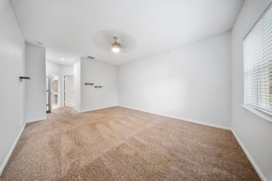 Bottom floor unit 2 bedroom and 2.5 bath located in Castle Pines on The Legacy Golf and Tennis Club in Florida - for sale on GolfHomes.com, golf home, golf lot