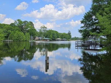 Beautiful .50-acre level building lot with a Boat Slip in Wyboo on Players Course At Wyboo Plantation in South Carolina - for sale on GolfHomes.com, golf home, golf lot