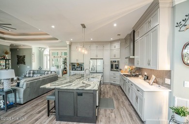 Looking for the WOW factor? Have a look at this low-maintenance on Ocean Ridge Plantation in North Carolina - for sale on GolfHomes.com, golf home, golf lot
