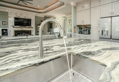 Looking for the WOW factor? Have a look at this low-maintenance on Ocean Ridge Plantation in North Carolina - for sale on GolfHomes.com, golf home, golf lot
