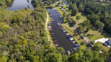 Beautiful .50-acre level building lot with a Boat Slip in Wyboo on Players Course At Wyboo Plantation in South Carolina - for sale on GolfHomes.com, golf home, golf lot