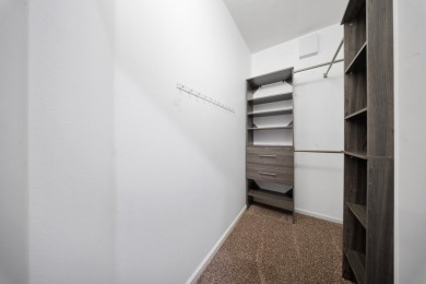 Bottom floor unit 2 bedroom and 2.5 bath located in Castle Pines on The Legacy Golf and Tennis Club in Florida - for sale on GolfHomes.com, golf home, golf lot