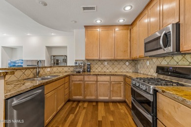 This beautiful penthouse condominium in Flagstaff Ranch Golf on Flagstaff Ranch Golf Club in Arizona - for sale on GolfHomes.com, golf home, golf lot