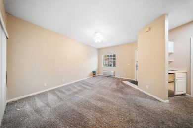 Bottom floor unit 2 bedroom and 2.5 bath located in Castle Pines on The Legacy Golf and Tennis Club in Florida - for sale on GolfHomes.com, golf home, golf lot