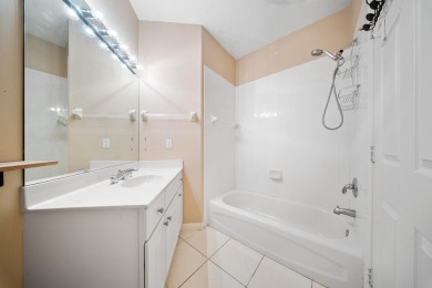 Bottom floor unit 2 bedroom and 2.5 bath located in Castle Pines on The Legacy Golf and Tennis Club in Florida - for sale on GolfHomes.com, golf home, golf lot