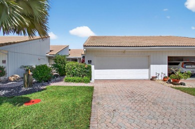 BEAUTIFULLY RENOVATED HOME WITH BREATHTAKING LAKE VIEWS on Boca West Golf and Country Club in Florida - for sale on GolfHomes.com, golf home, golf lot