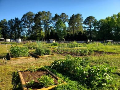 Beautiful .50-acre level building lot with a Boat Slip in Wyboo on Players Course At Wyboo Plantation in South Carolina - for sale on GolfHomes.com, golf home, golf lot