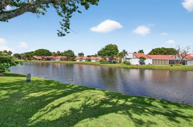 BEAUTIFULLY RENOVATED HOME WITH BREATHTAKING LAKE VIEWS on Boca West Golf and Country Club in Florida - for sale on GolfHomes.com, golf home, golf lot