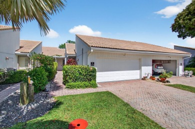 BEAUTIFULLY RENOVATED HOME WITH BREATHTAKING LAKE VIEWS on Boca West Golf and Country Club in Florida - for sale on GolfHomes.com, golf home, golf lot