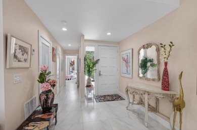 BEAUTIFULLY RENOVATED HOME WITH BREATHTAKING LAKE VIEWS on Boca West Golf and Country Club in Florida - for sale on GolfHomes.com, golf home, golf lot