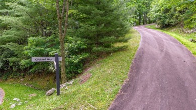 This generously sized 5.85 acre estate property includes two on Sapphire National Golf Club in North Carolina - for sale on GolfHomes.com, golf home, golf lot