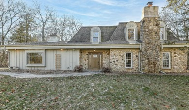 Your cottage in the woods awaits! Nestled on a 3-acre wooded lot on Kettle Moraine Golf Club in Wisconsin - for sale on GolfHomes.com, golf home, golf lot