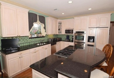 ELEGANT VISCAYA VILLA IN THE GREENS with FULL FINISHED BASEMENT on The Greens At Half Hollow in New York - for sale on GolfHomes.com, golf home, golf lot