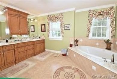 ELEGANT VISCAYA VILLA IN THE GREENS with FULL FINISHED BASEMENT on The Greens At Half Hollow in New York - for sale on GolfHomes.com, golf home, golf lot