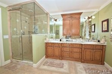 ELEGANT VISCAYA VILLA IN THE GREENS with FULL FINISHED BASEMENT on The Greens At Half Hollow in New York - for sale on GolfHomes.com, golf home, golf lot