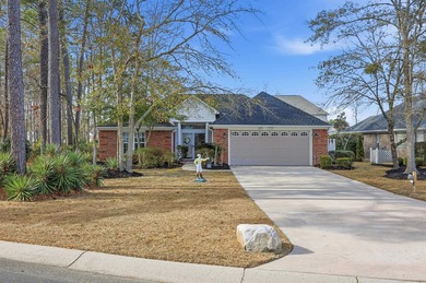 558 Quail Court is a beautiful brick home situated on a wooded on Long Bay Club in South Carolina - for sale on GolfHomes.com, golf home, golf lot