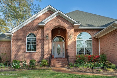 This is a gorgeous brick, 3-bedroom, 4 full-bathroom home in The on Sound Golf Links at Albemarle Plantation in North Carolina - for sale on GolfHomes.com, golf home, golf lot