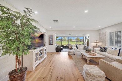 Incredible opportunity to own a twin villa that lives like a on  in Florida - for sale on GolfHomes.com, golf home, golf lot