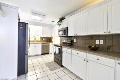 Beautifully maintained Pool Home. Perfectly located in the heart on Golden Gate Country Club in Florida - for sale on GolfHomes.com, golf home, golf lot