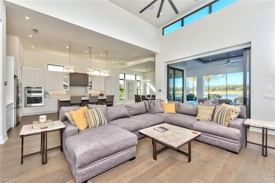 Stunning custom residence offering picturesque lake and on Miromar Lakes Golf Club in Florida - for sale on GolfHomes.com, golf home, golf lot