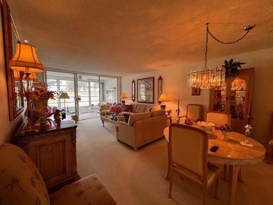 Discover an incredible opportunity in the desirable Palm-Aire on Palm-Aire Country Club and Resort - Palms in Florida - for sale on GolfHomes.com, golf home, golf lot