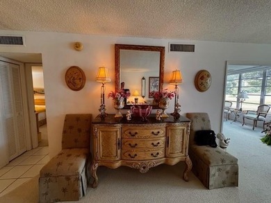 Discover an incredible opportunity in the desirable Palm-Aire on Palm-Aire Country Club and Resort - Palms in Florida - for sale on GolfHomes.com, golf home, golf lot