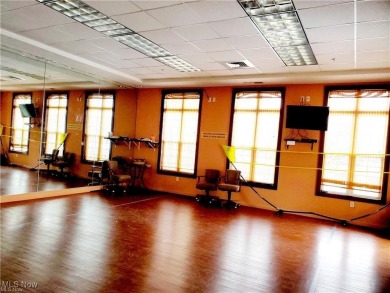 Like Your Own Health Club! Exercise room, pool, tennis, golf on Fox Creek Golf and Racquet Club in Ohio - for sale on GolfHomes.com, golf home, golf lot