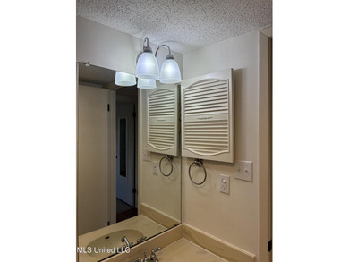 First floor unit on the Golf Course. New outlets, hardware on Diamondhead Country Club in Mississippi - for sale on GolfHomes.com, golf home, golf lot