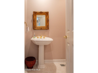 This is a gorgeous brick, 3-bedroom, 4 full-bathroom home in The on Sound Golf Links at Albemarle Plantation in North Carolina - for sale on GolfHomes.com, golf home, golf lot