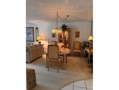 Discover an incredible opportunity in the desirable Palm-Aire on Palm-Aire Country Club and Resort - Palms in Florida - for sale on GolfHomes.com, golf home, golf lot