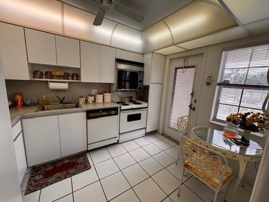 Discover an incredible opportunity in the desirable Palm-Aire on Palm-Aire Country Club and Resort - Palms in Florida - for sale on GolfHomes.com, golf home, golf lot