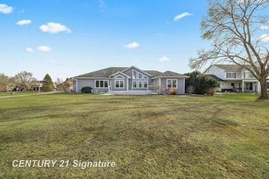 Welcome to this stunning, move in ready home that overlooks the on Swan Valley Golf Club in Michigan - for sale on GolfHomes.com, golf home, golf lot