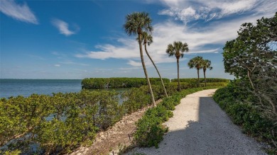 Welcome to this breathtaking, fully remodeled, turnkey furnished on Longboat Key Golf Club Resort in Florida - for sale on GolfHomes.com, golf home, golf lot