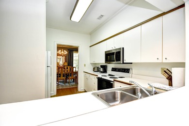 Beautifully Renovated Condo with Golf Course Views in Pawleys on Pawleys Plantation Golf and Country Club in South Carolina - for sale on GolfHomes.com, golf home, golf lot