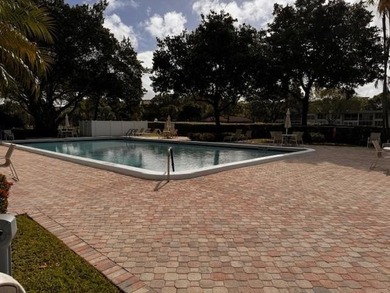 Discover an incredible opportunity in the desirable Palm-Aire on Palm-Aire Country Club and Resort - Palms in Florida - for sale on GolfHomes.com, golf home, golf lot