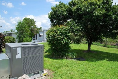 Updated and move-in ready, this residence is nestled in the on Six Lakes Country Club in Florida - for sale on GolfHomes.com, golf home, golf lot