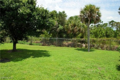 Updated and move-in ready, this residence is nestled in the on Six Lakes Country Club in Florida - for sale on GolfHomes.com, golf home, golf lot