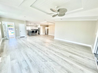 Welcome to Luxury living in the heart of the prestigious 55+ on Crane Lakes Golf and Country Club in Florida - for sale on GolfHomes.com, golf home, golf lot
