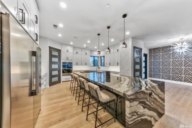 This home is a singular masterpiece, offering an unmatched on Montreux Golf and Country Club in Nevada - for sale on GolfHomes.com, golf home, golf lot