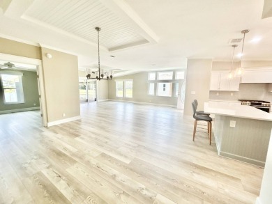 Welcome to Luxury living in the heart of the prestigious 55+ on Crane Lakes Golf and Country Club in Florida - for sale on GolfHomes.com, golf home, golf lot